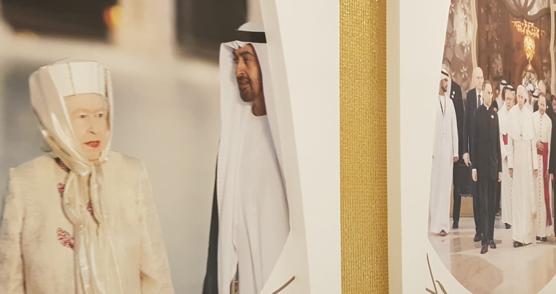 At the entranceway, detail from the exhibition of visitors (to left, HM Queen Elizabeth II; to right, Papal entourage). 