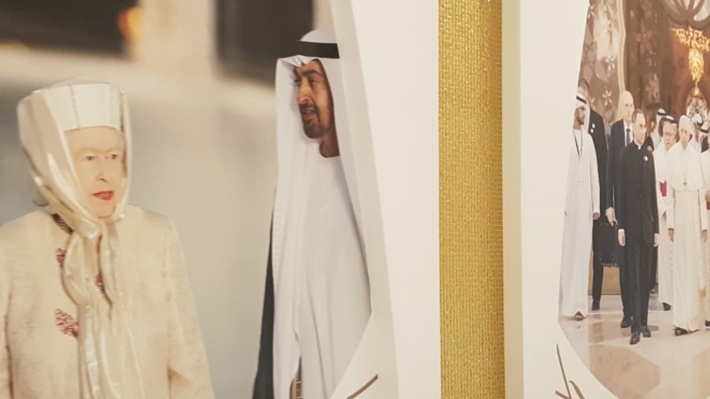 At the entranceway, detail from the exhibition of visitors (to left, HM Queen Elizabeth II; to right, Papal entourage). 