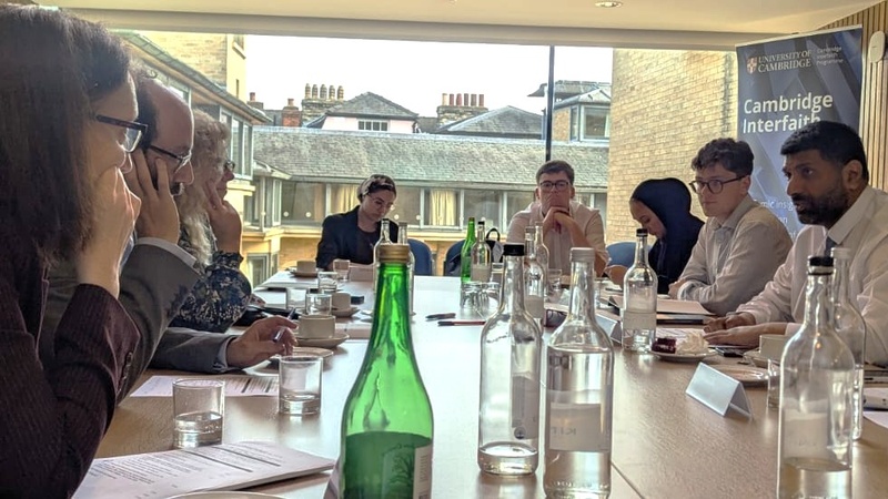 Lord Khan and others in dialogue