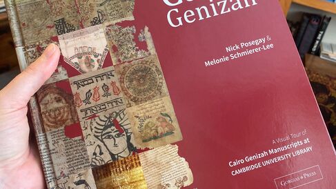 Detail of book cover, held to camera