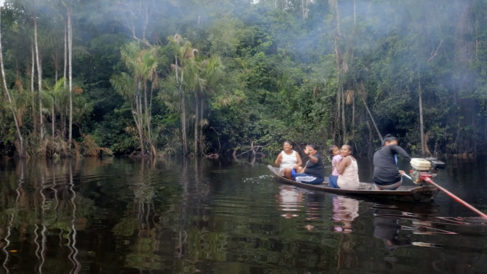 Indigenous women on a boat
