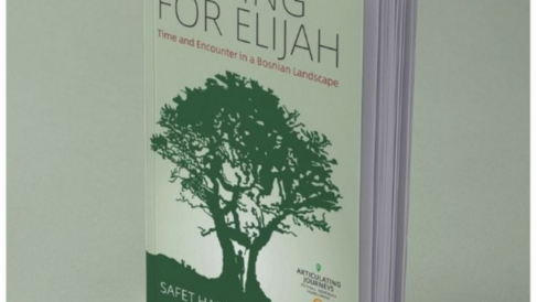 A paperback book stands at an angle