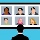 Suited person viewing six participants in a conference call