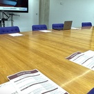 Large oval table set up for event