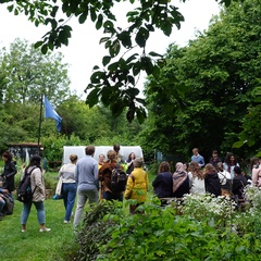 Summer School participants in a community garden 
