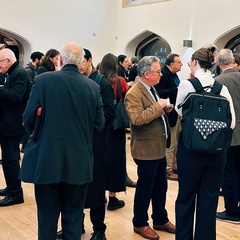 Animated clusters of people chatting over coffee