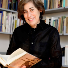 Professor Frishman, surrounded by books