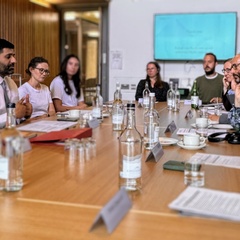 Lord Khan and others in dialogue