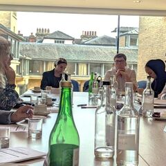 Lord Khan and others in dialogue