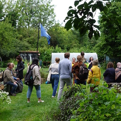 Photo of the Empty Common Community Garden with summer school participants