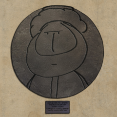 Cartoon-style portrait of Maimonides with a manuscript-type object in front