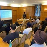 Satnam Singh presents to a seated audience