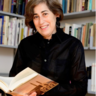 Professor Frishman, surrounded by books