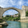 The old bridge in Mostar, rising above the waters to connect parts of the city