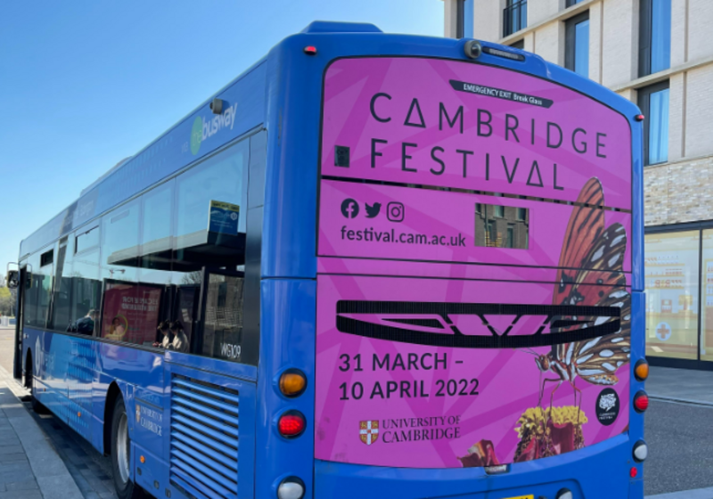 Festival advertisement on the back of a Cambridge bus
