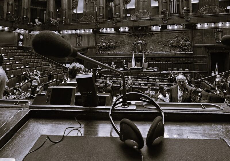 View looking down from Parliamentary seat, microphone in foreground