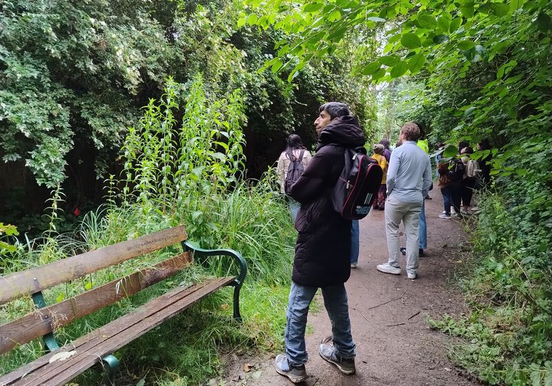 Group in green outdoor setting