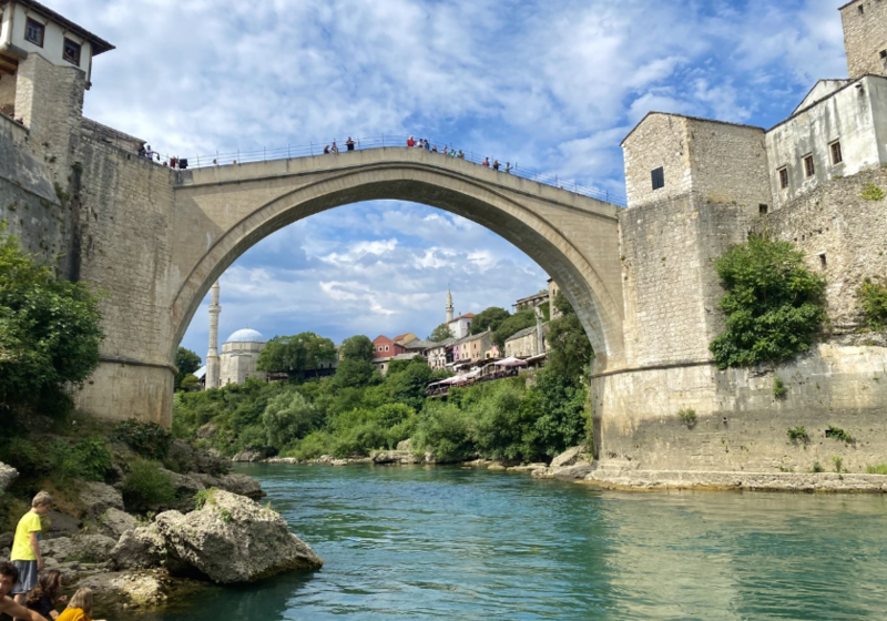 The old bridge in Mostar, rising above the waters to connect parts of the city