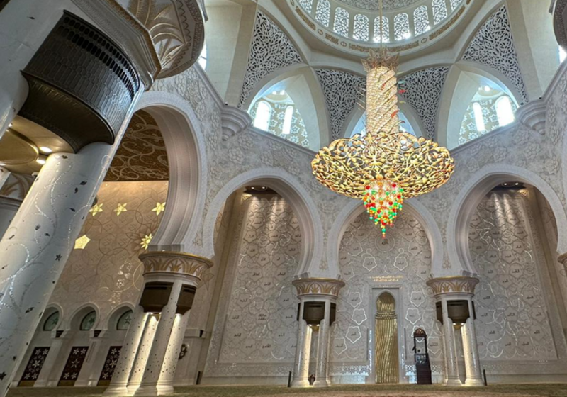 Almost monochrome yet highly decorated, curved and abstract, the interior. 