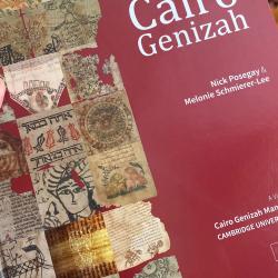 Detail of book cover, held to camera