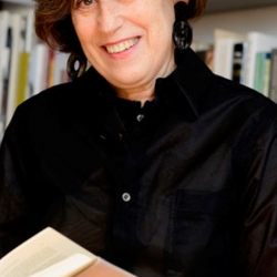 Professor Frishman, surrounded by books
