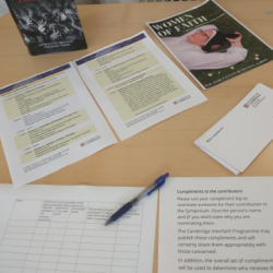 Photos from the start of the day - Registration table with sign-in sheet and programme, plus coffee and pastries awaiting attendees.
