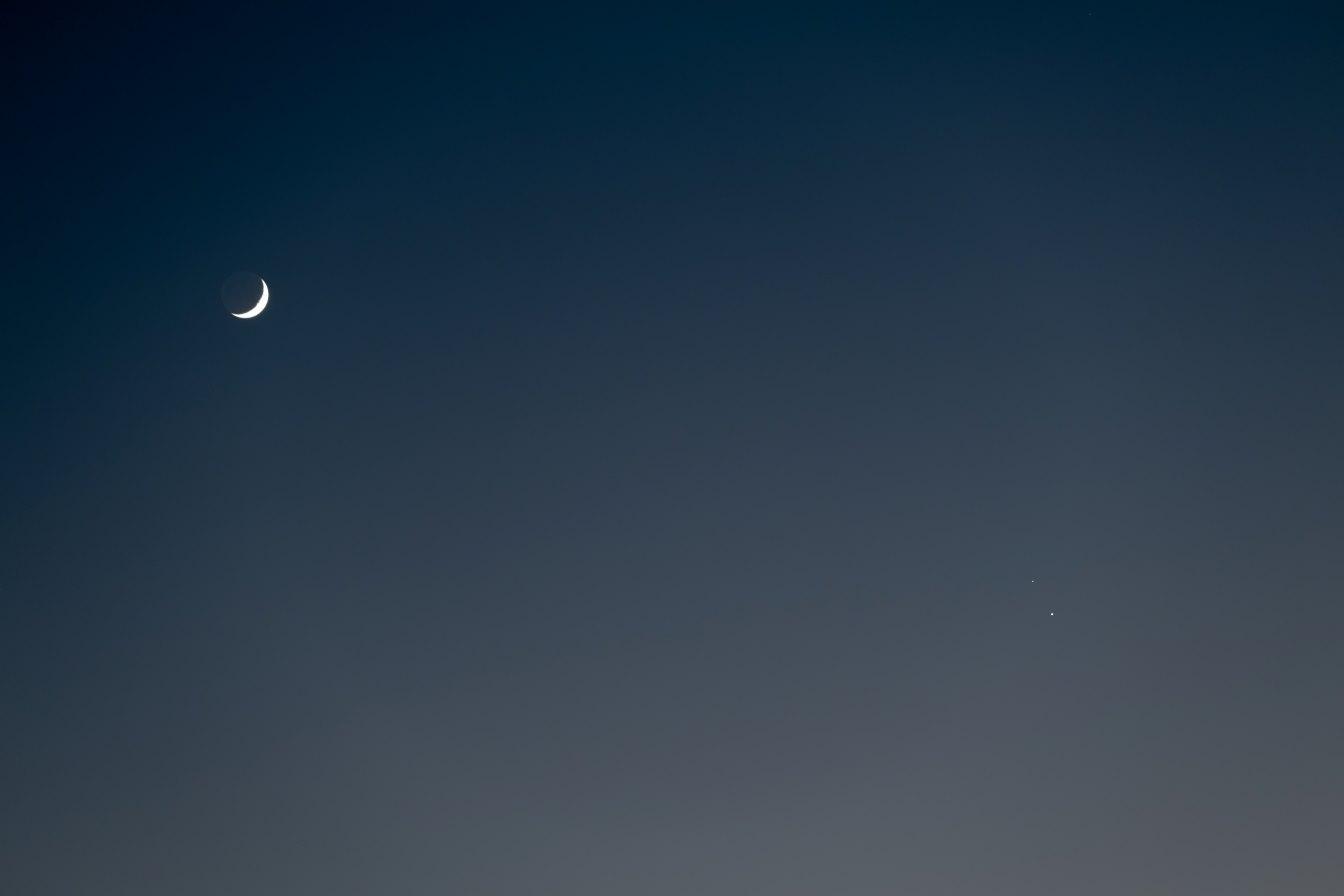 Photo by Stephen Rahn (via Stocksnap, licensed for Creative Commons use) Crescent moon against grey-blue sky
