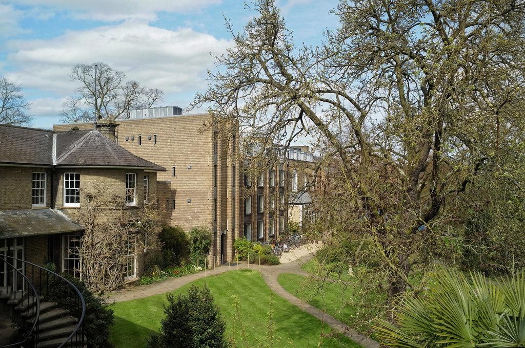 View of the grounds of Darwin College (from 1 Newnham Terrace) - photo by Julien Paren (2018) licensed for reuse (Creative Commons 2.0). View of the grounds of Darwin College from an upper storey of 1 Newnham Terrace (a college-owned property), showing the juxtaposition of old and new buildings and natural greenery..