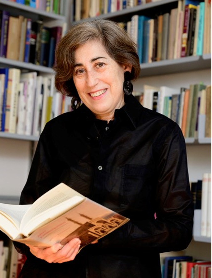 Professor Frishman - photograph by Rick Keus, used with permission Professor Frishman, surrounded by books