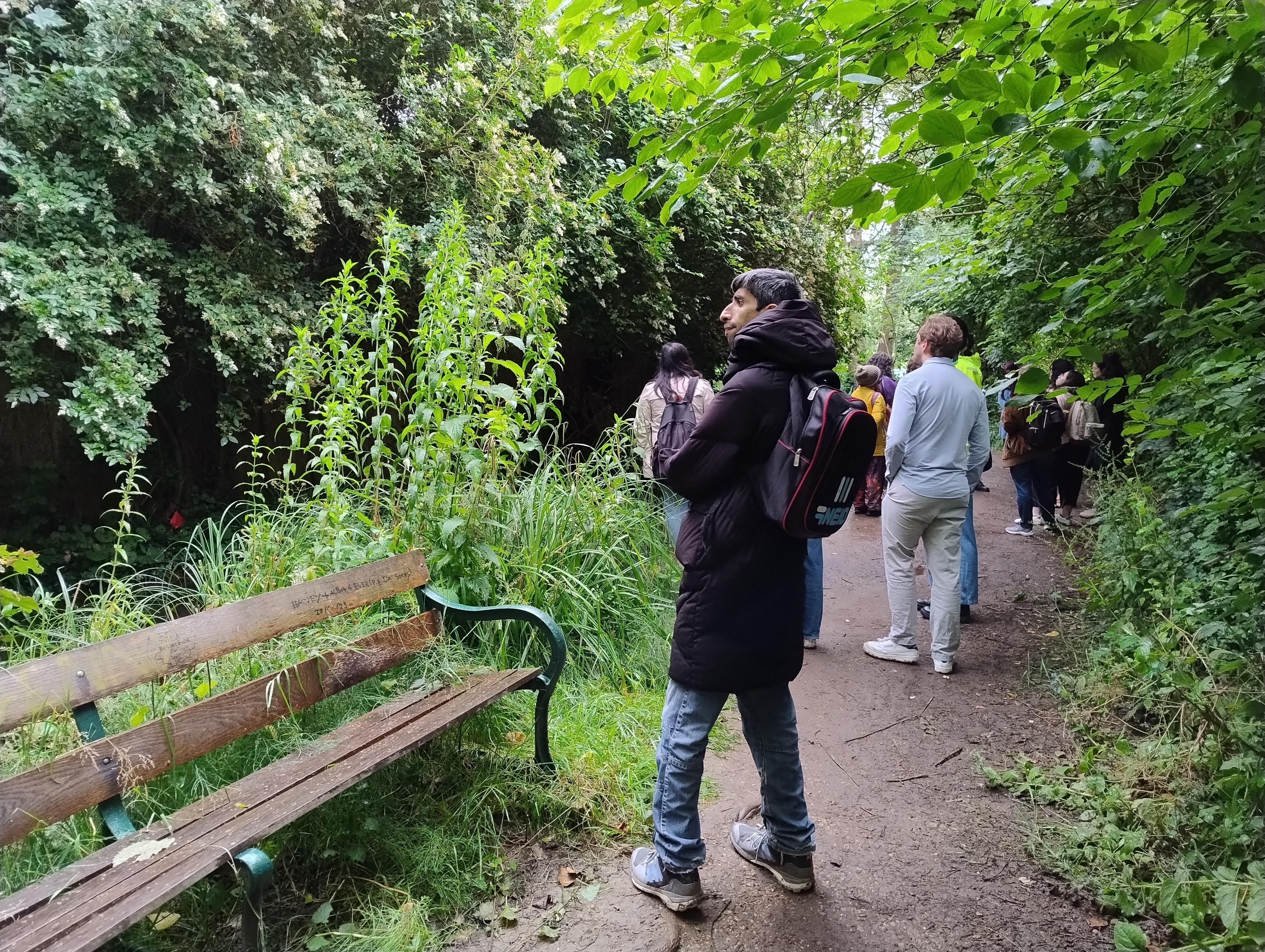 Toqueer and other participants on the Cam-side field trip, CIP 2024 Group in green outdoor setting