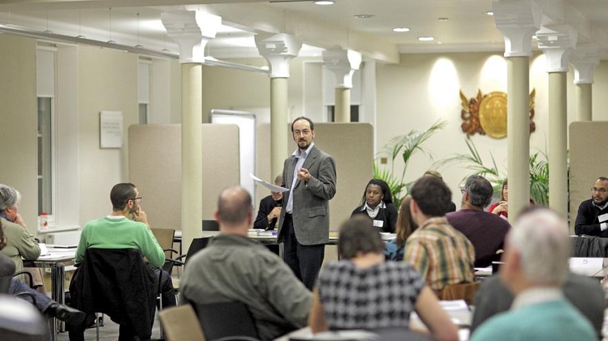 Scriptural Reasoning overview (photograph by Sir Cam for the University of Cambridge, 2011) Scriptural Reasoning overview - facilitator addresses the group