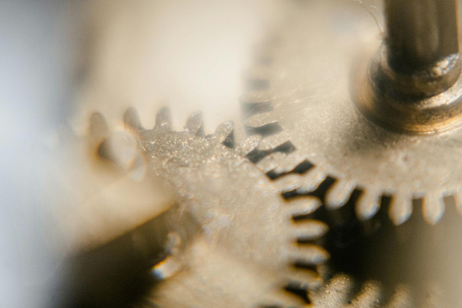 Gears of a clock – original photo by Tima Miroshnichenko (2021) via pexels.com Inner workings of a clock in close-up
