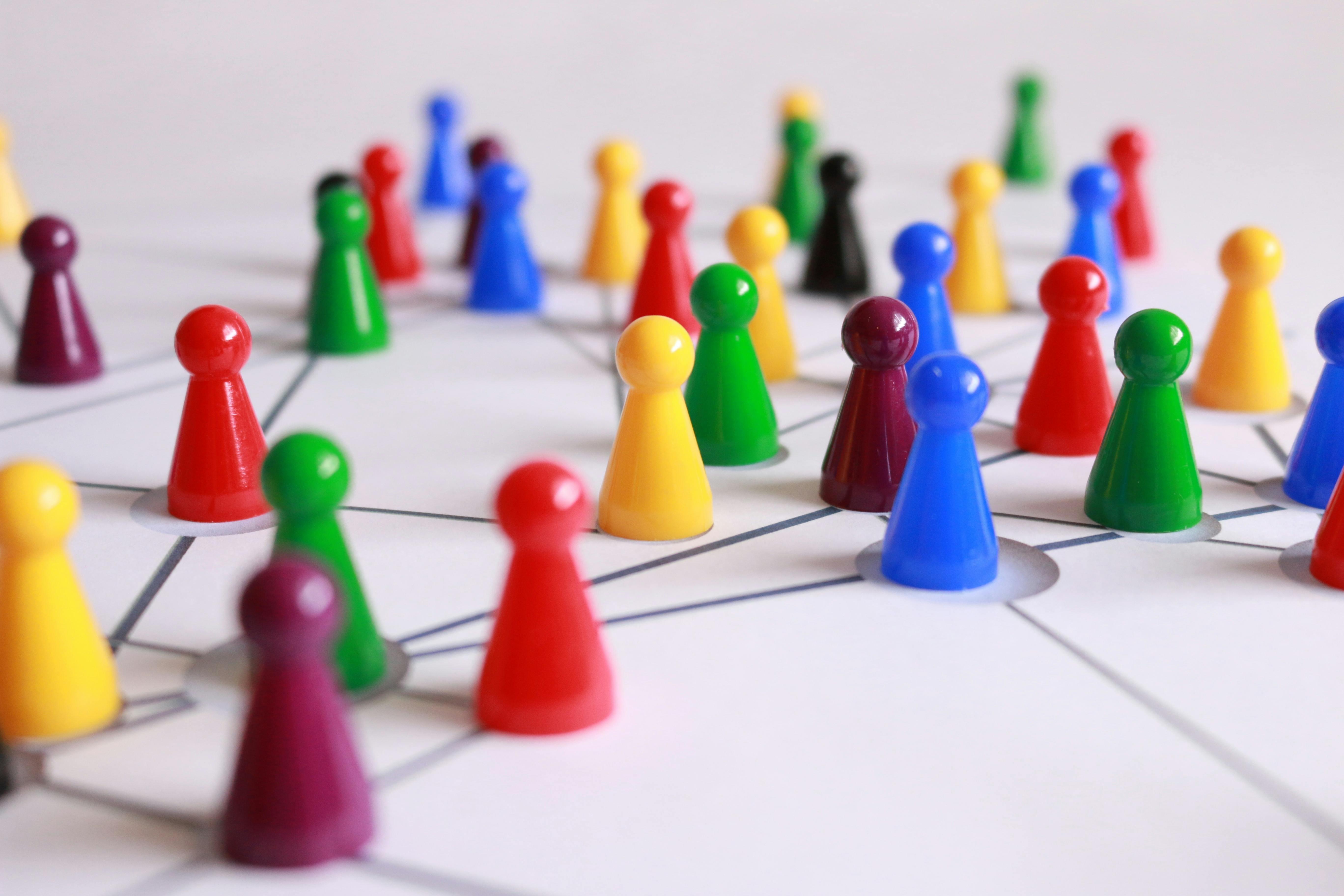 Meeple in a network – Pixabay (2015) via pexels.com Coloured meeple placed on a black ink sketch to visualise a network