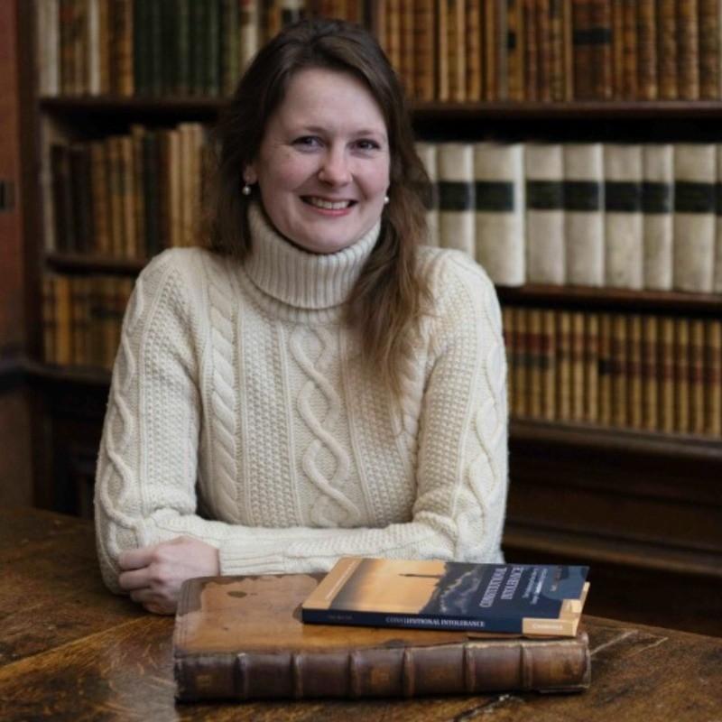 Dr Marietta van der Tol – courtesy of MDCV 2025 Marietta, seated at table in library setting