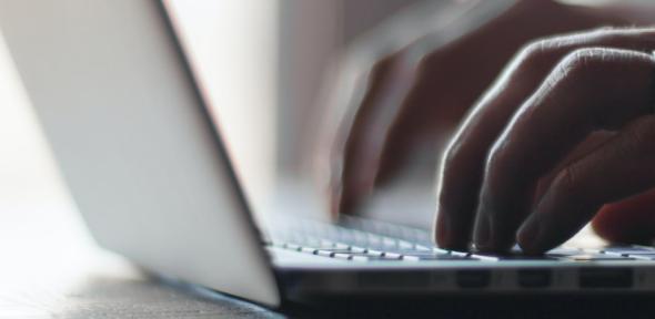 Working on a laptop — original photograph by Thomas Lefebvre (via Unsplash) Hands on laptop keyboard