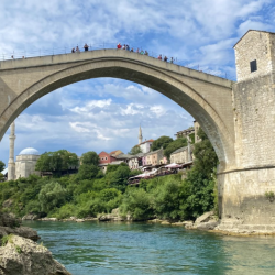 The old bridge in Mostar, rising above the waters to connect parts of the city