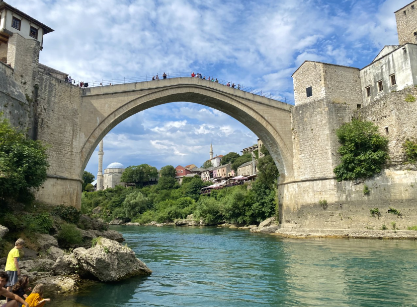 The old bridge in Mostar, rising above the waters to connect parts of the city